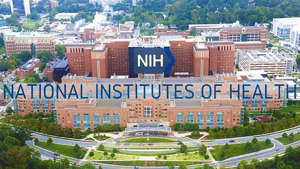 Scientists Warn of Setbacks as NIH Cuts Overhead Grants